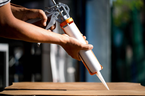 A relevant stock photo of adhesive silicone in a typical setting.