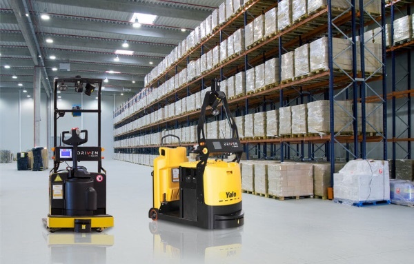A relevant stock photo of agv forklift in a typical setting.