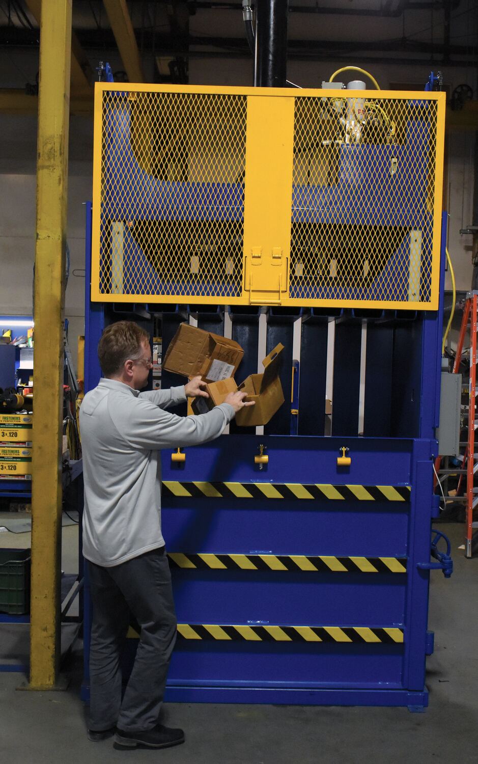 A relevant stock photo of baler machine in a typical setting.