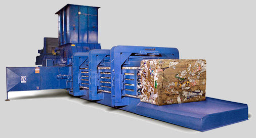 A relevant stock photo of baler machinery in a typical setting.