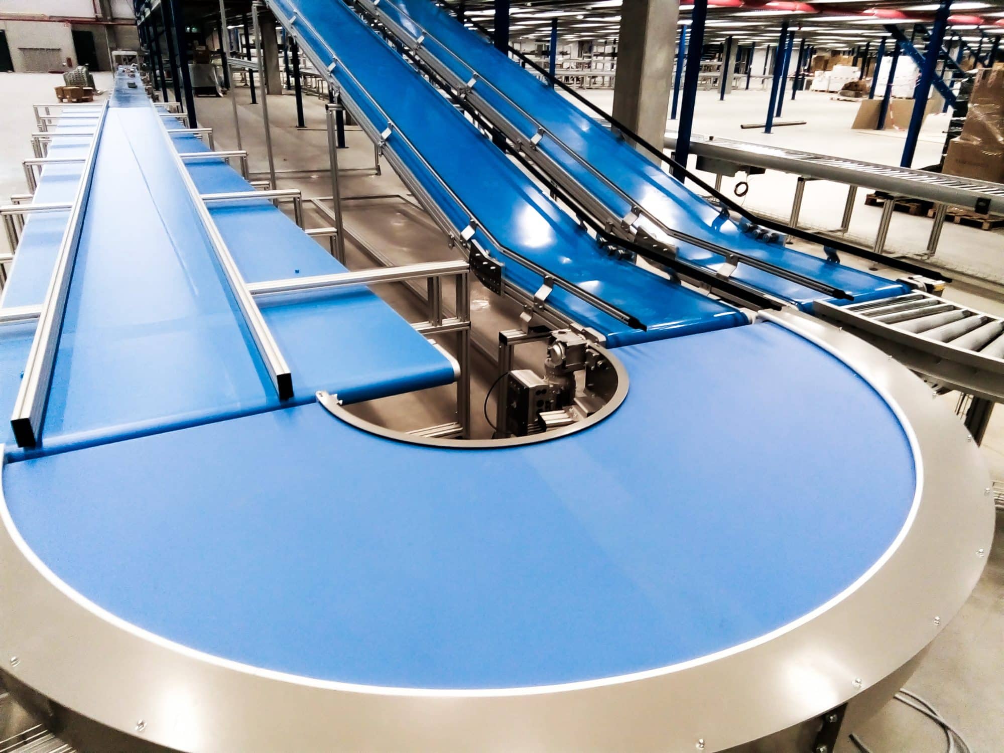 A relevant stock photo of belt conveyor systems in a typical setting.