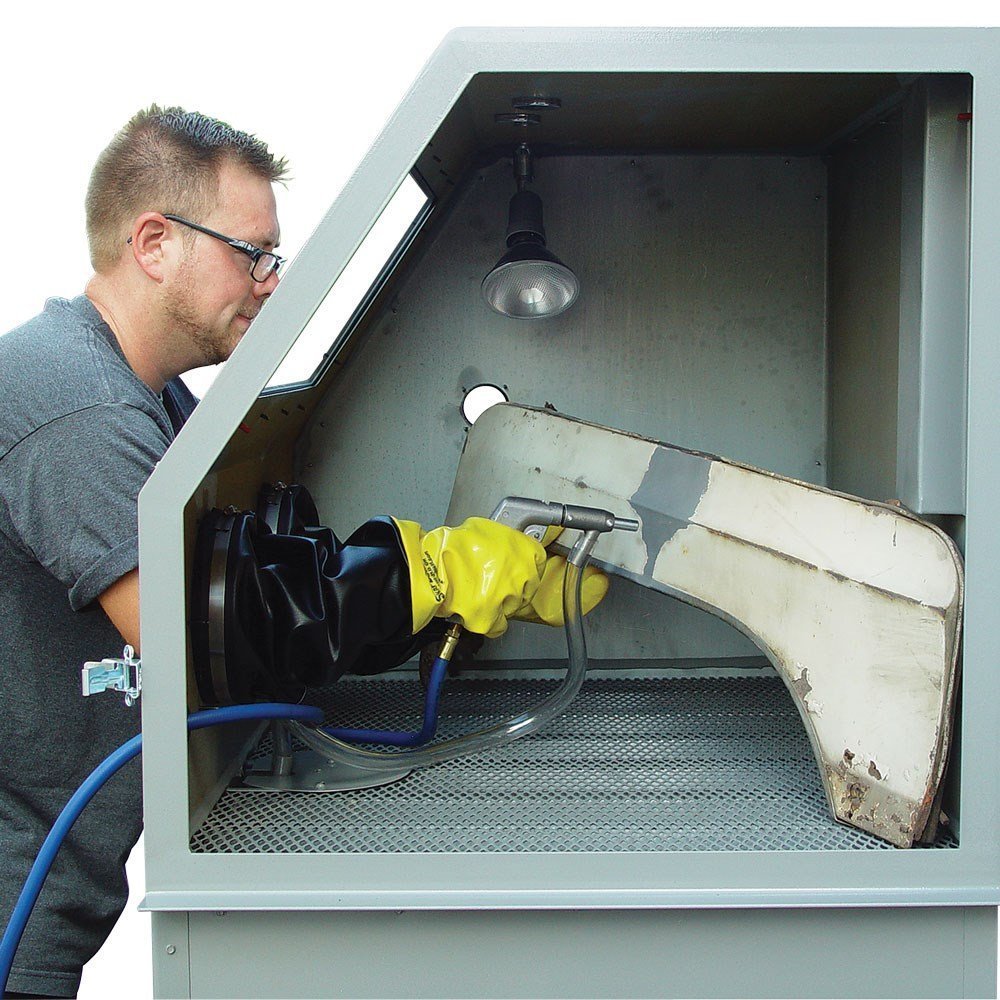 A relevant stock photo of blast cabinet in a typical setting.