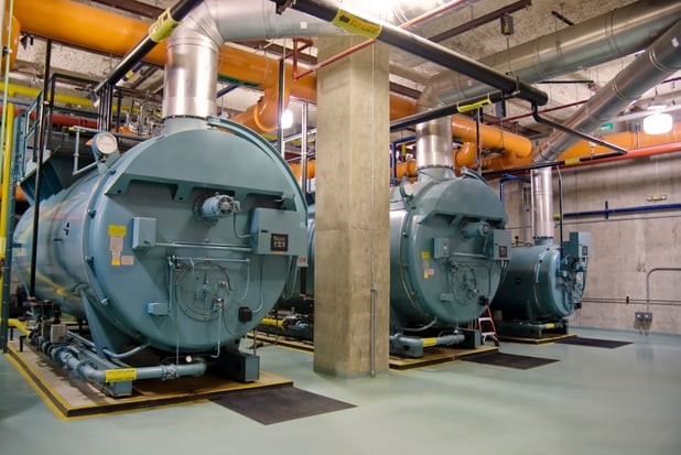 A relevant stock photo of boiler system in a typical setting.