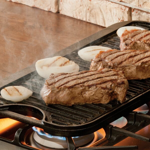 A relevant stock photo of cast iron griddle in a typical setting.