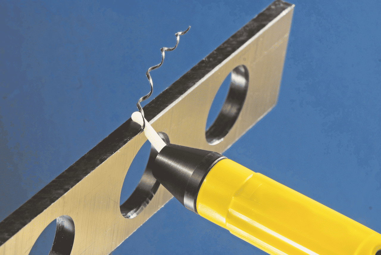 A relevant stock photo of deburring tool in a typical setting.