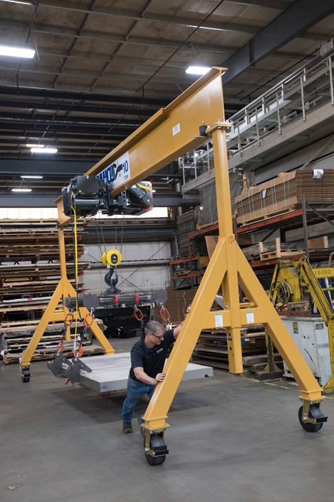 A relevant stock photo of gantry crane in a typical setting.