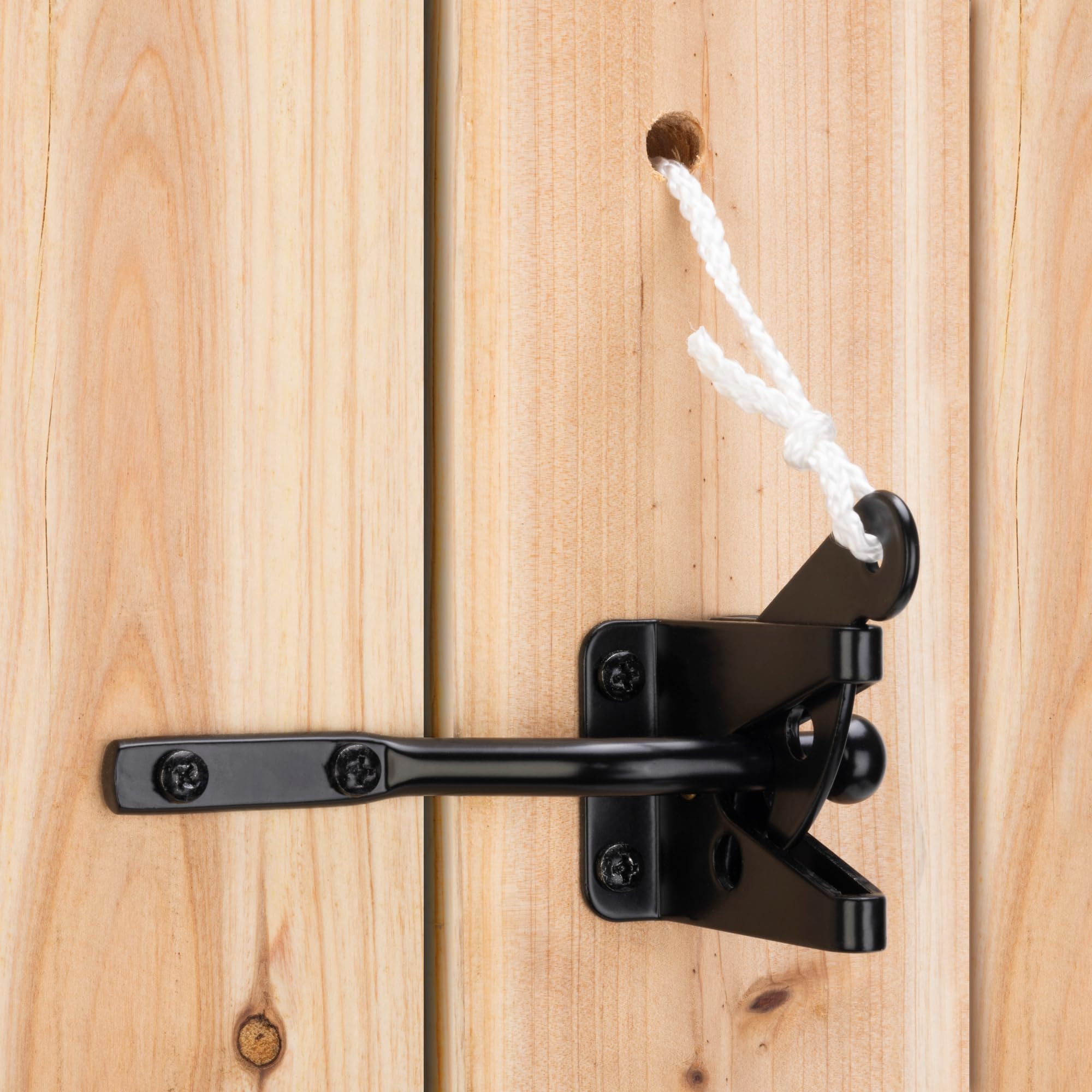 A relevant stock photo of gate latches in a typical setting.