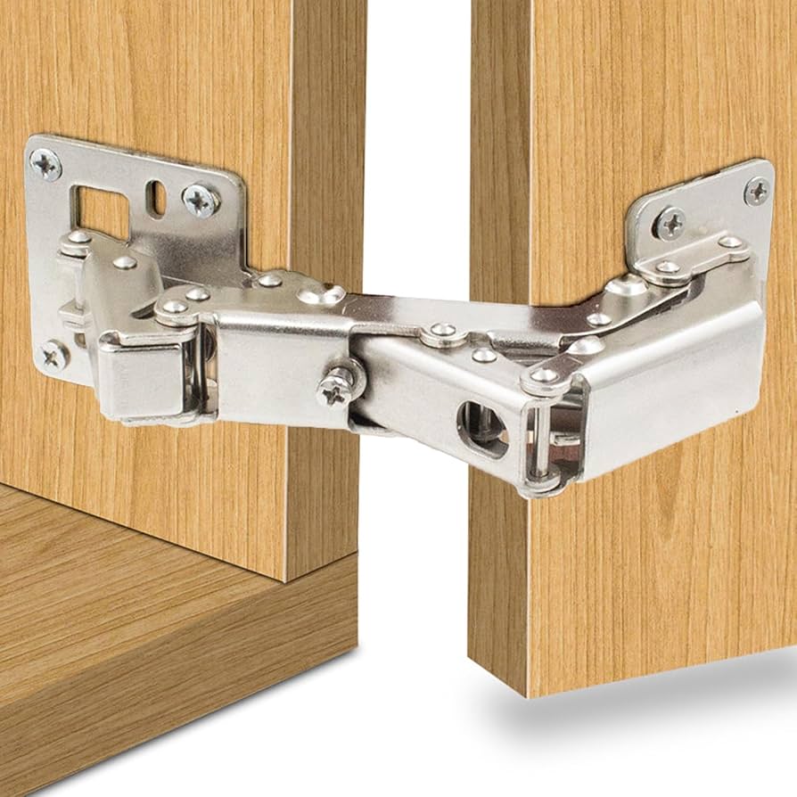 A relevant stock photo of hidden cabinet hinges in a typical setting.