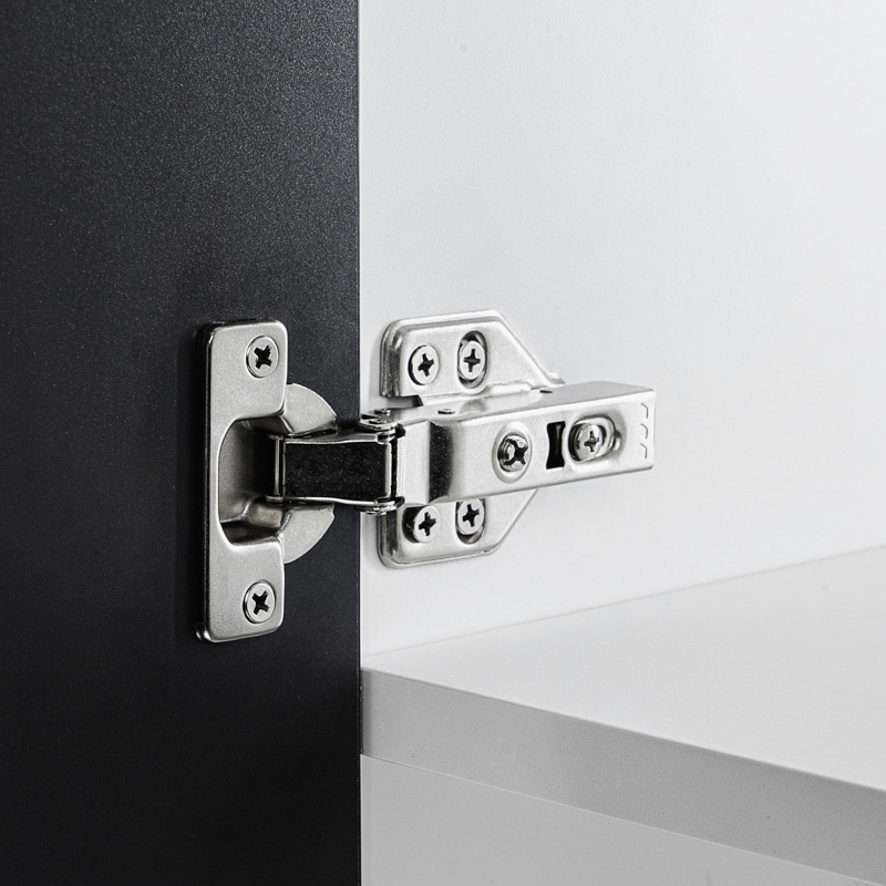 A relevant stock photo of hidden cabinet hinges in a typical setting.