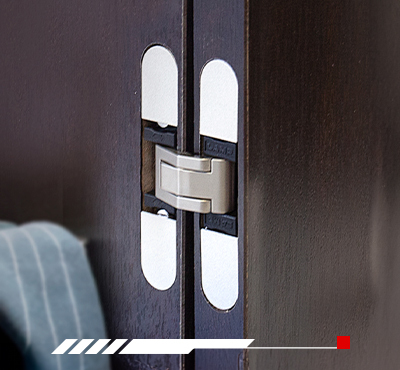 A relevant stock photo of invisible cabinet hinges in a typical setting.