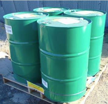 A relevant stock photo of metal barrel in a typical setting.