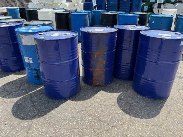 A relevant stock photo of metal barrel in a typical setting.