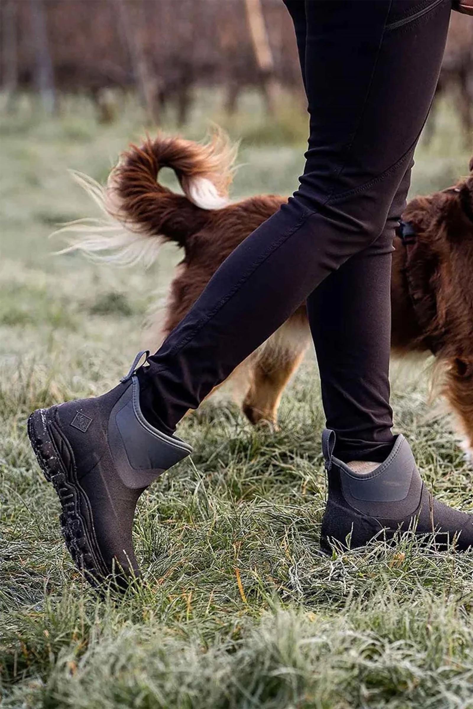 A relevant stock photo of muck wellies ladies in a typical setting.