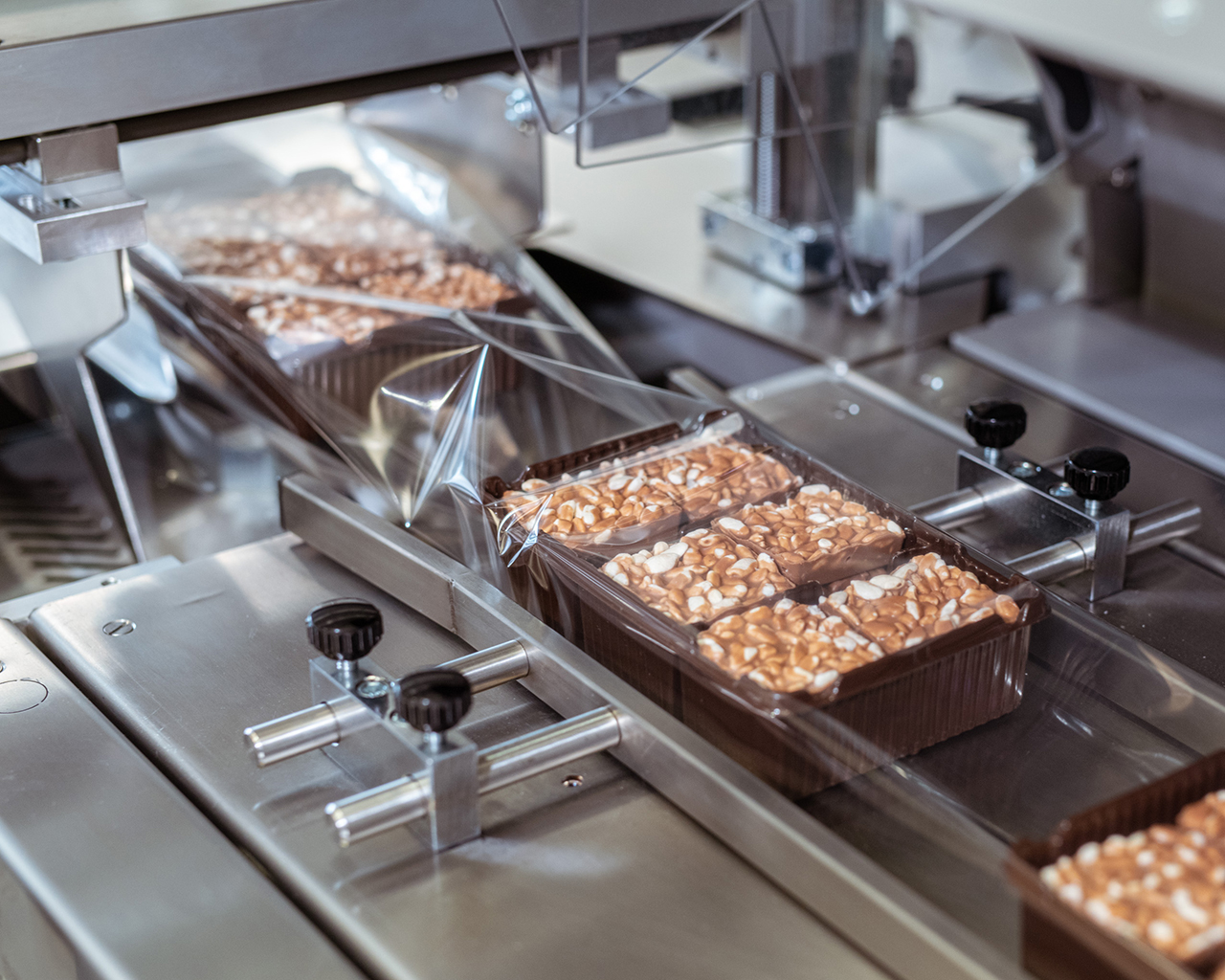 A relevant stock photo of packaging machine in a typical setting.
