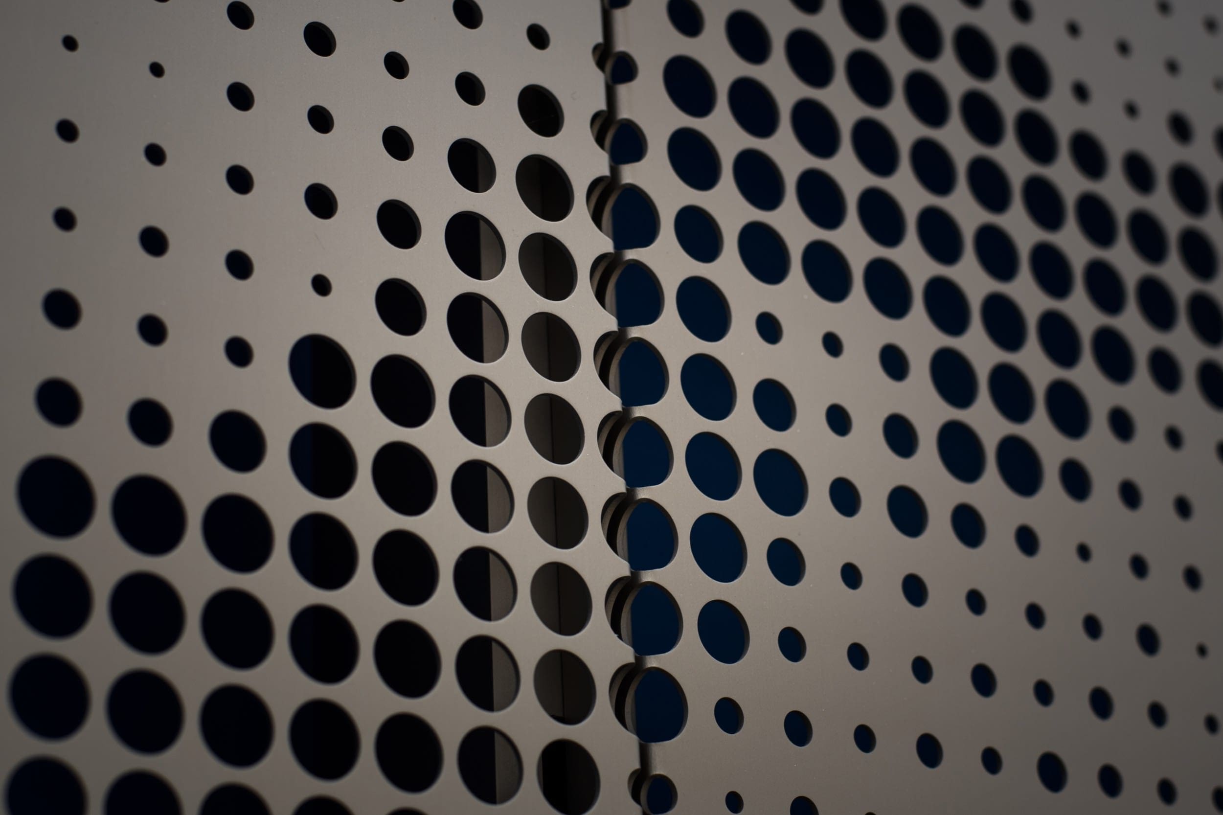 A relevant stock photo of perforated metal panels in a typical setting.
