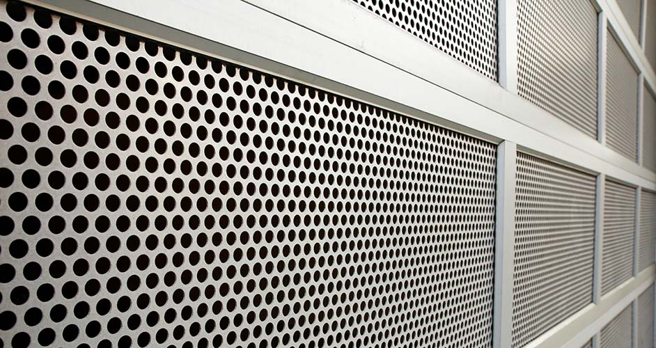 A relevant stock photo of perforated metal panels in a typical setting.