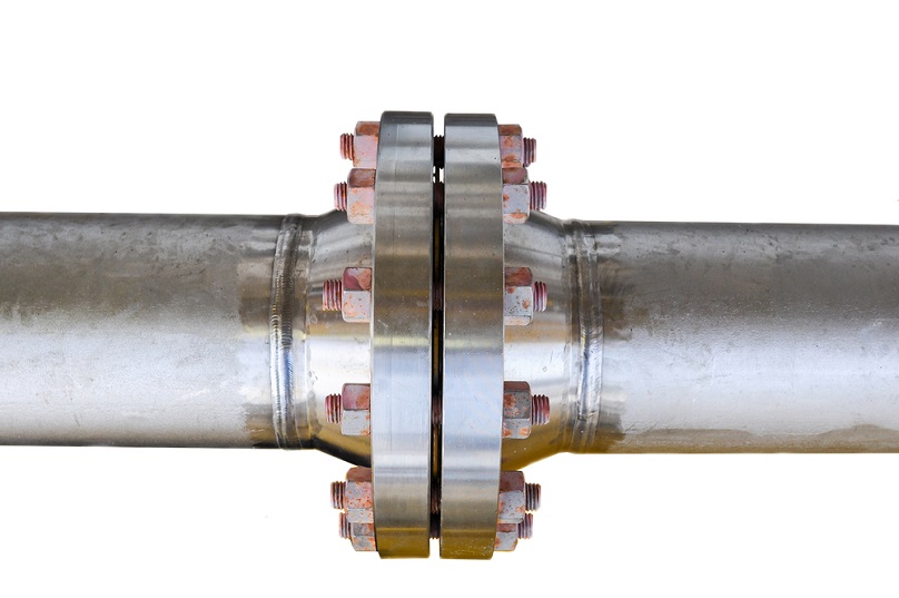 A relevant stock photo of pipe flange in a typical setting.