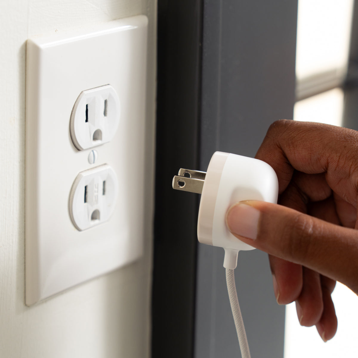 A relevant stock photo of power cords in a typical setting.