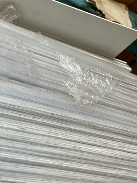 A relevant stock photo of sheets of fibreglass in a typical setting.