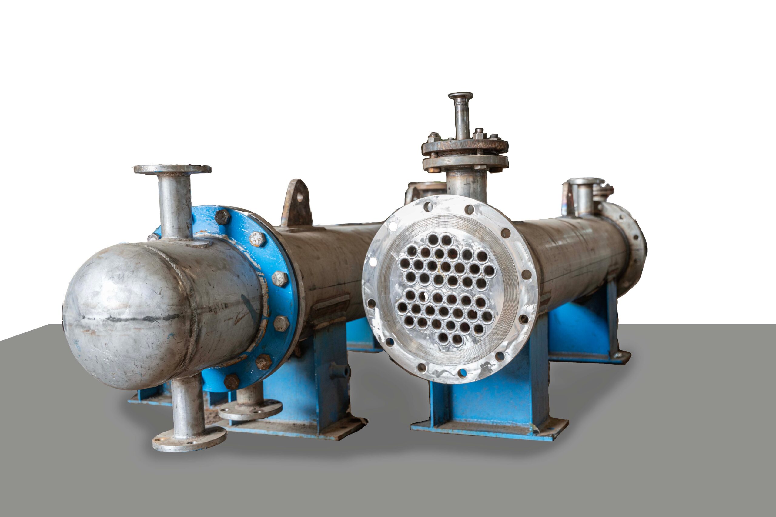 A relevant stock photo of shell & tube type heat exchanger in a typical setting.