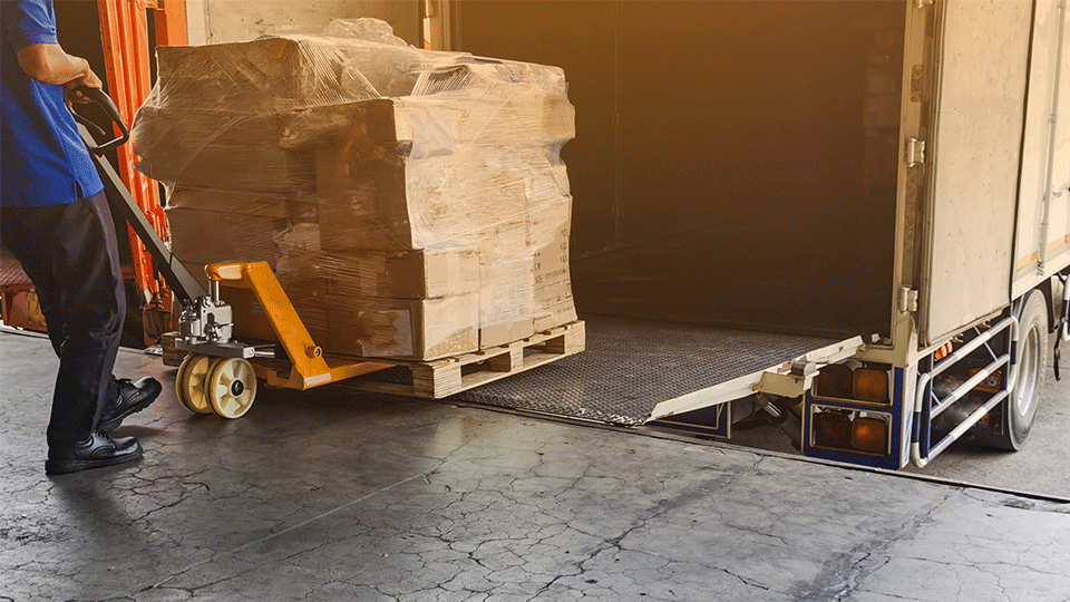 A relevant stock photo of shipping palate in a typical setting.