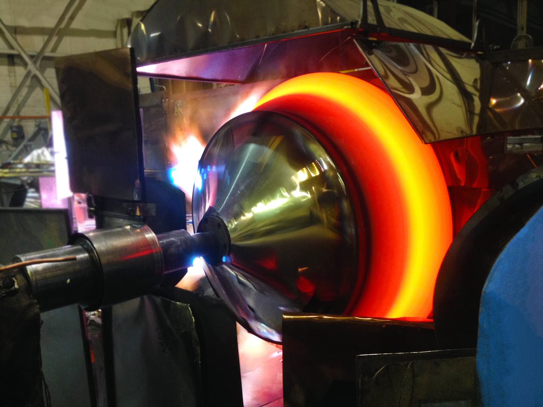 A relevant stock photo of spin forming in a typical setting.