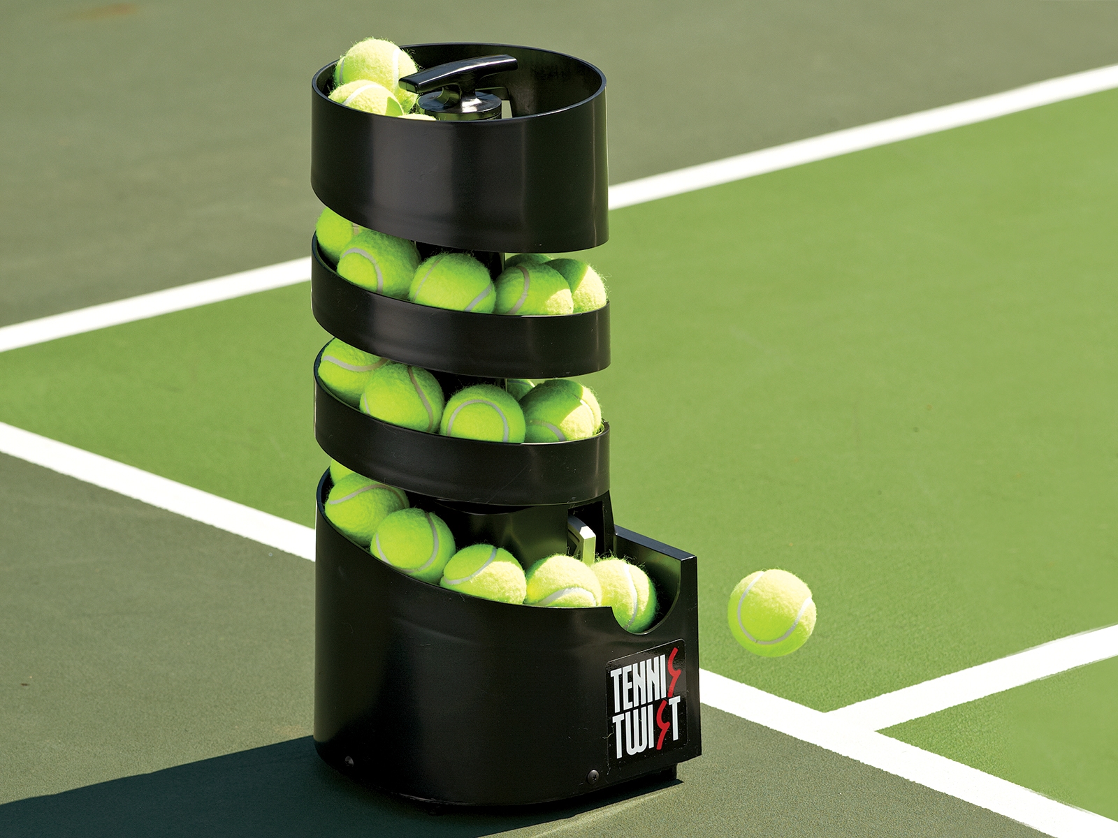 A relevant stock photo of tennis ball machine in a typical setting.