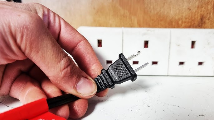 A relevant stock photo of us mains socket in a typical setting.