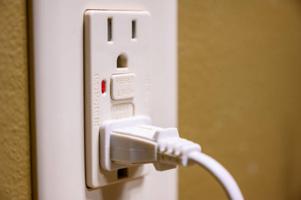 A relevant stock photo of usa electrical socket in a typical setting.
