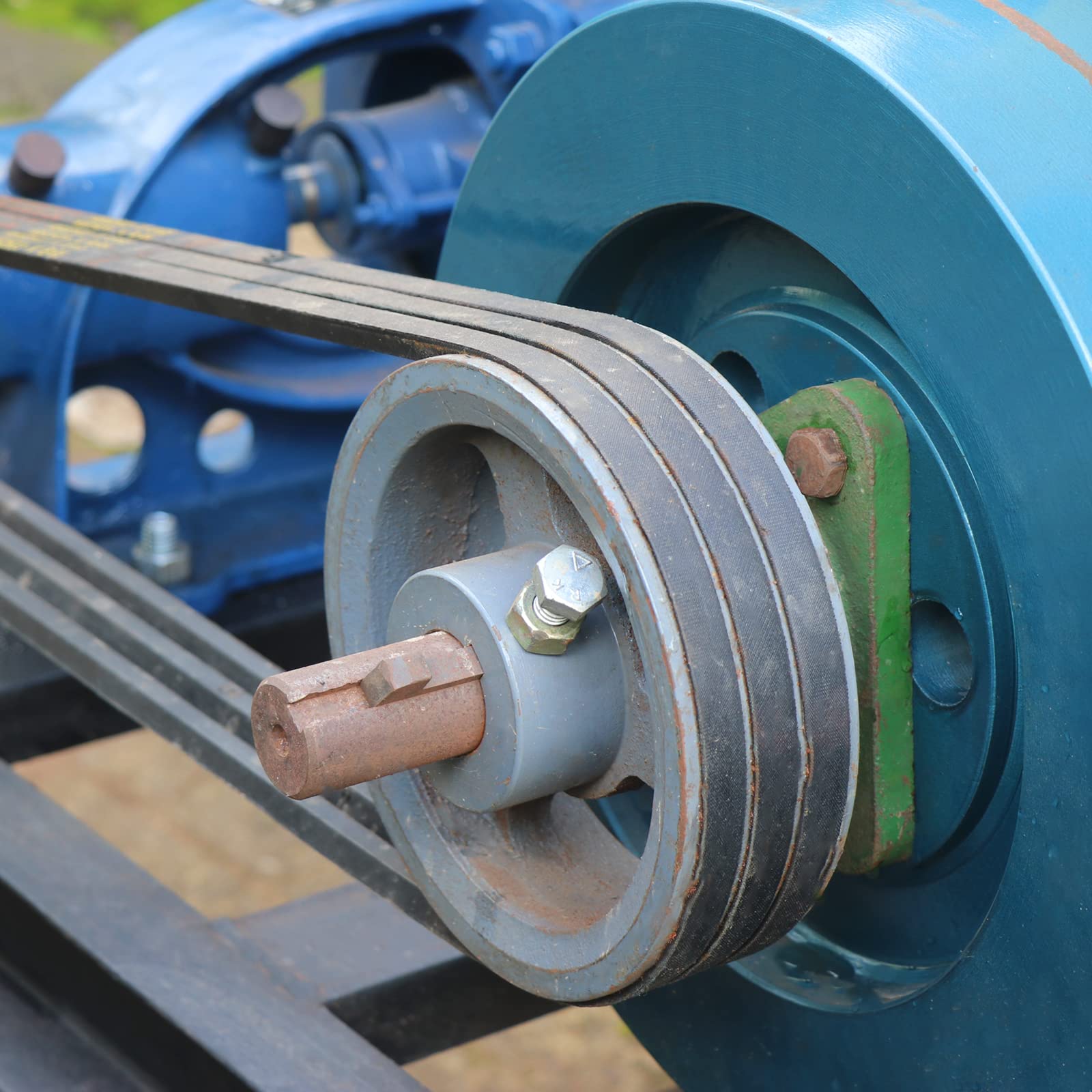 A relevant stock photo of v belt drive in a typical setting.