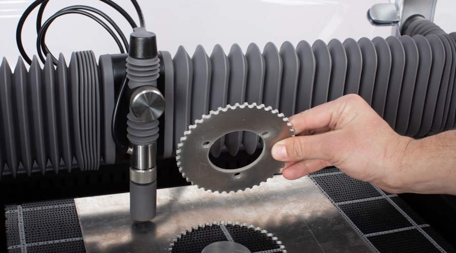 A relevant stock photo of water jet cutter in a typical setting.